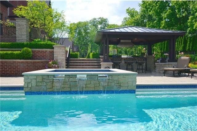 Wow House Rochester Hills Estate Has Saltwater Pool Hot Tub With Waterfall Rochester Mi Patch