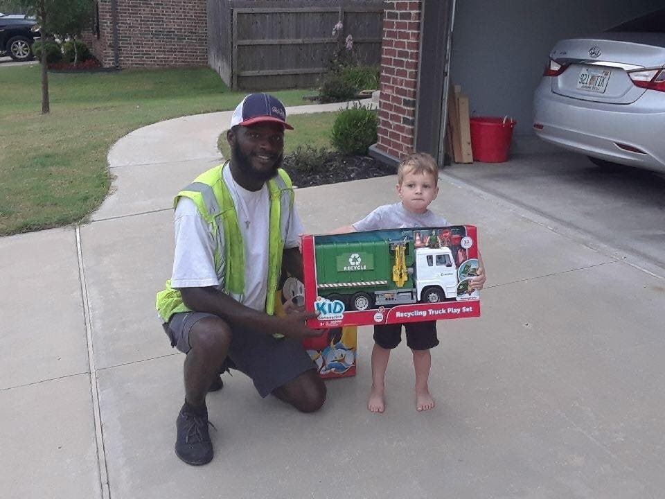 Aaron Mitchell, a sanitation driver in Jenks, Oklahoma, surprised a young boy on his route with a toy recycling truck. The two became friends as the boy waits patiently to greet Williams when he pulls up to the curb on his regular Thursday route.