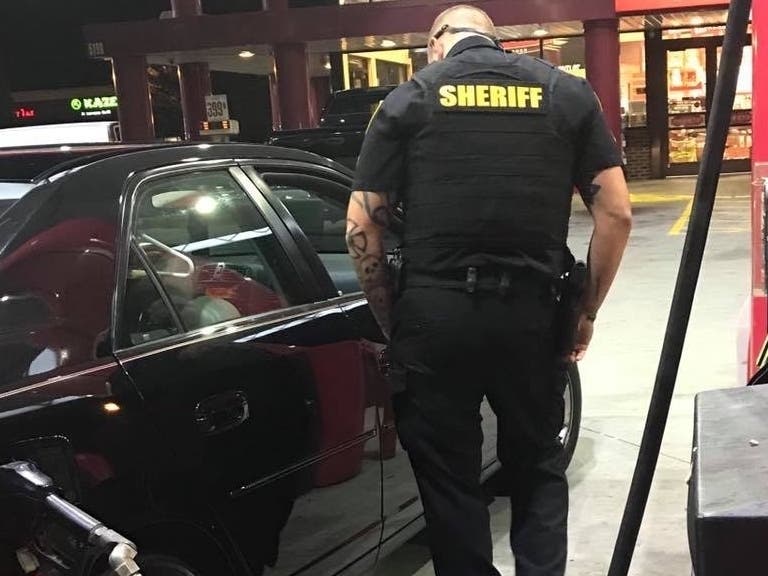 Forsyth County Deputy Chris Owen used his own credit card to fill the gas tank of a disabled woman who didn't have enough fuel to get home.