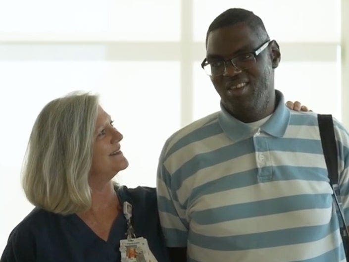 Piedmont Newman Hospital nurse Lori Wood adopted 27-year-old Jonathan Pinkard, an autistic man with no support system, so he could get a life-saving heart transplant. 