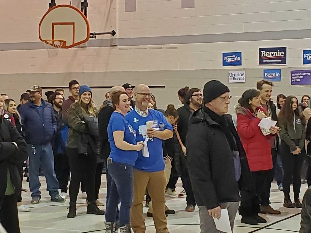 Supporters of Vermont independent Sen. Bernie Sanders congregate in the first show of preference in an Iowa Caucus precinct in West Des Moines, Iowa.