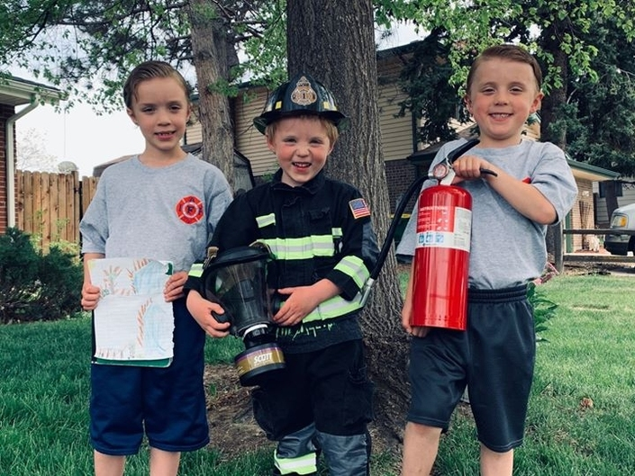 Three brothers discovered a fire at a neighbor's house in Arvada, Colorado, and took action. 
