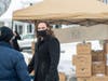 Roxbury Resident and Kiwanis Member Morris County Surrogate Heather Darling distributing food to residents in need