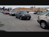 Cars line up for food at a recent Kiwanis Club Food Distribution