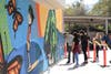 Snyder spray the last colors with help from CHMS students