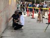 Bryan Snyder teaches a student how to spraypaint