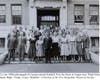 A group of students standing at the entrance of Rundlett Junior High on Spring Street