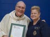 Woodridge Mayor Gina Cunningham presented Fr. Norbert with a Village Proclamation making the weeked of May 14 & 15th "Fr. Norbert Raszeja, CR Weekend" in our Village.