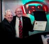 Rich Moore presenting the Paul Harris Fellow Certicate to Henry Ristic