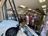 A car crashed into a storefront at 91st and 151st streets late Tuesday morning. 