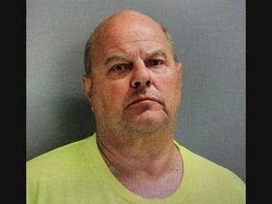 Police said William Wigboldy, 61, of Lemont was seen on camera adjusting the angles of the cameras he had planted, Tinley Park Police said. 