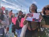 Emani Davis, a freshman at Homewood-Flossmoor High School, protests outside the school Thursday, Nov. 3. 