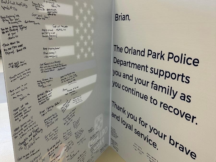 The public is invited to sign a card for injured former OPPD officer and current Illinois State Trooper Brian Frank. 
