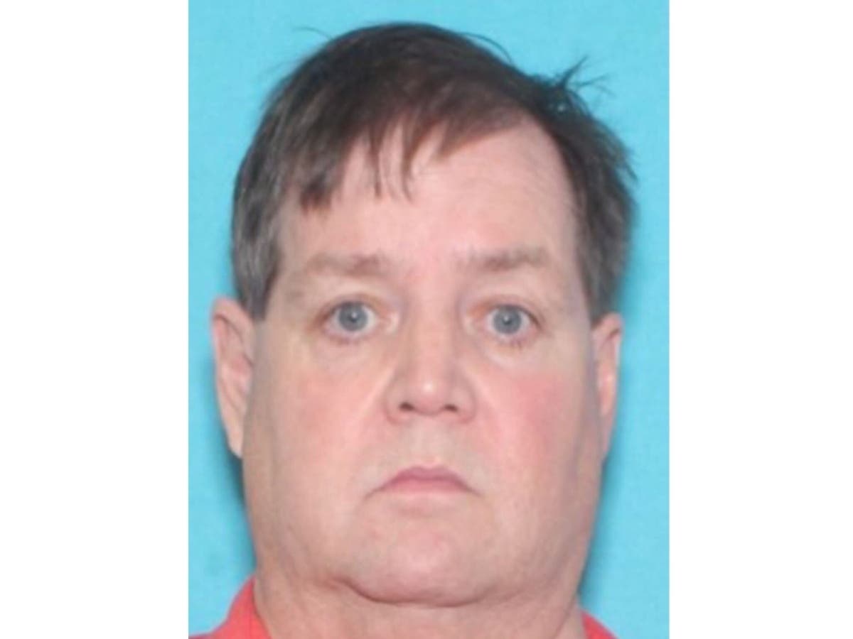 Mike Henry, 67, has been arrested on charges of threatening public officials, Illinois State Police said Friday. 