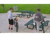 Still frames from video footage show some children at Main Park, where picnic tables were damaged. 
