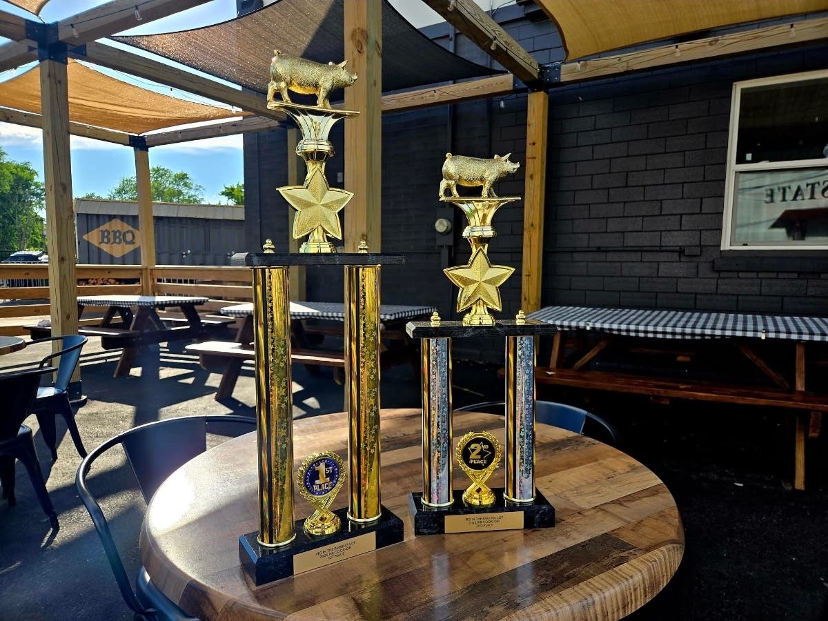 The top 2 finishers in the inaugural Pig In the Parking Lot Rib Cook-off will take home these trophies.