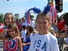 Mokena Chamber of Commerce's July 4 parade marched on in heat between storms. 