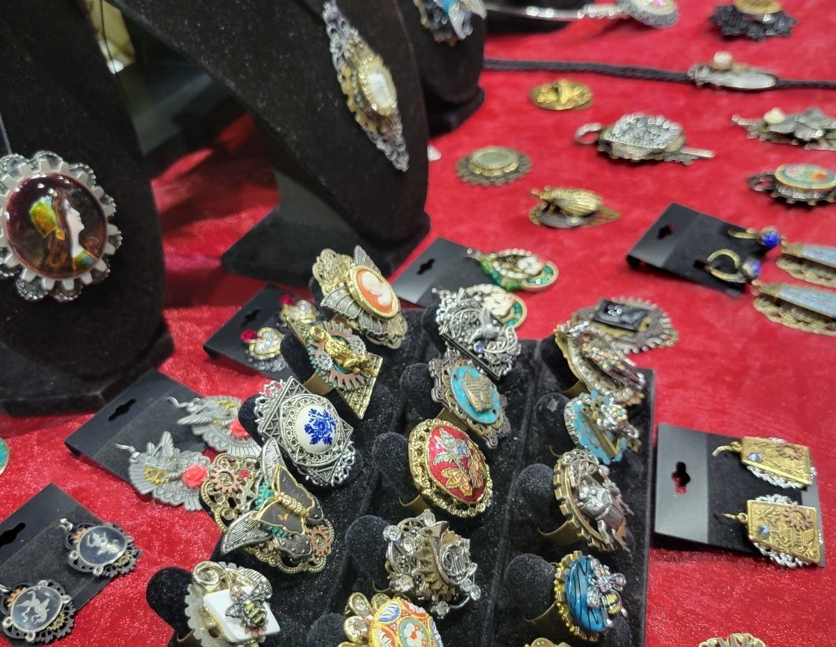 Scarab Sanctuary sells a variety of jewelry and apparel from rings to scarabs - check out Kimmie's latest collection at the July Flurry.