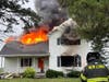 The Kestel house on Cedar Road south of Laraway Road was intentionally set ablaze and allowed to burn to the ground Friday. It had been used for live fire training July 29–31, and since March. 