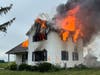 The Kestel house on Cedar Road south of Laraway Road was intentionally set ablaze and allowed to burn to the ground Friday. It had been used for live fire training July 29–31, and since March. 