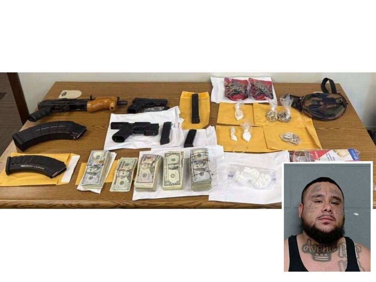 A Dolton man faces felony gun and drug charges after a narcotics investigation, the Cook County Sheriff's Office said. 