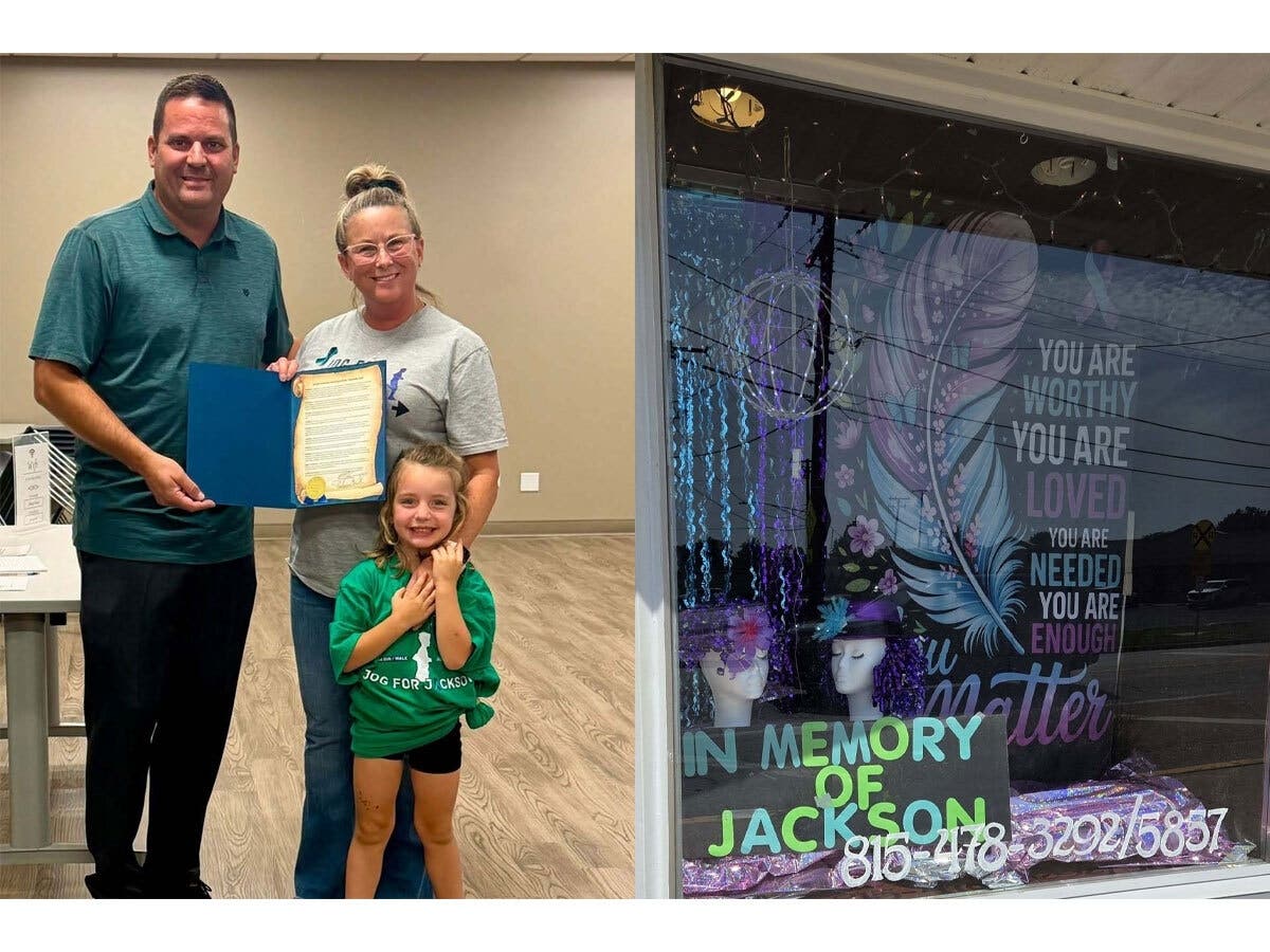 Manhattan Mayor Mike Adrieansen, with Shelly Lewis, holding a proclamation designating September as Suicide Prevention Month in Manhattan. Local business Manhattan Beauty Techs Salon, with a display honoring the memory of Jackson Lewis. 