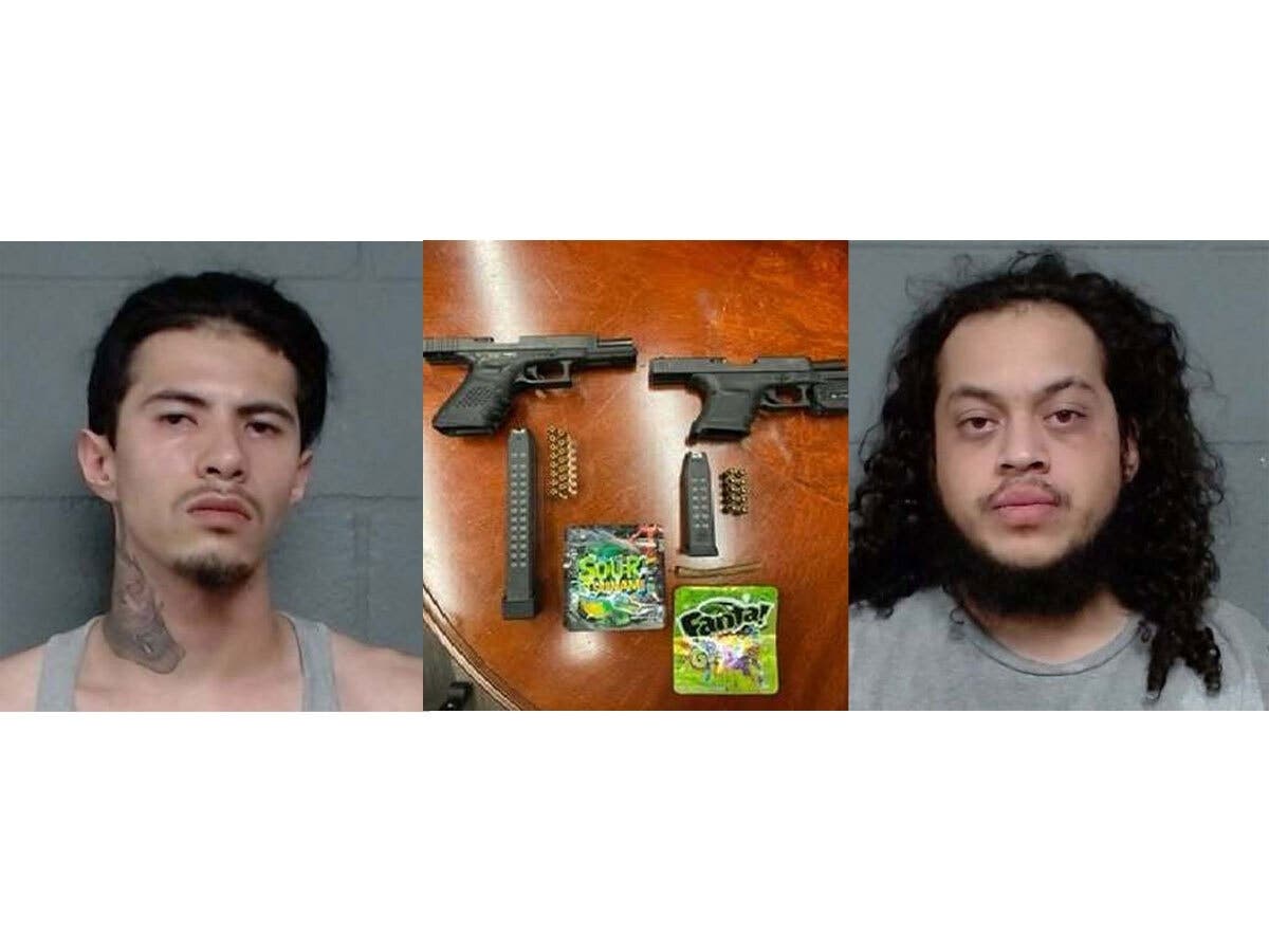 Two men face gun charges after a traffic stop in Chicago Heights, the Cook County Sheriff's Office said.