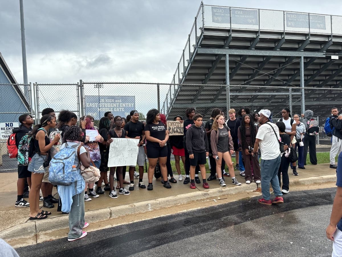 Some Lincoln-Way East students on Wednesday participated in a walkout, voicing their anger and frustration toward classmates that had engaged in racist taunts toward Homewood-Flossmoor High School football fans on Friday, Sept. 4. 