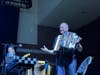 Geraint Watkins plays the accordion with Roger Daltrey in New Lenox on Saturday, Sept. 12. 