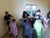 Free haircuts were given to local children by professional stylists.