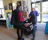 Jackie Leach, Safe Kids Northern NJ, discusses car seat safety with health fair attendee Melicia Patrick.