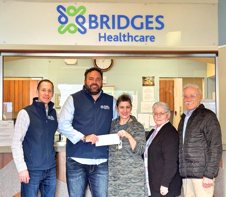 On March 19, 2026, Chris Taft and Ken Steeves of the It’s Free to Dream Foundation presented a check to Bridges CEO Jennifer Fiorillo and Board Members Kathy Hendricks and Ray Vitali. 