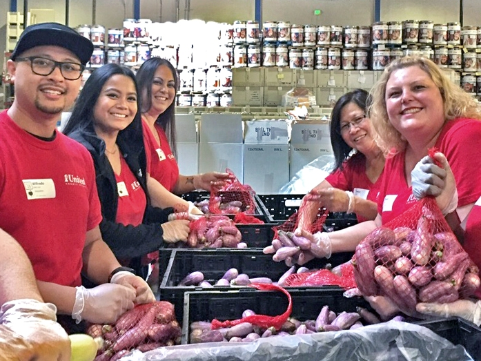 1st United Credit Union volunteering at the Food Bank (pre-COVID)