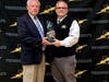 Bob Keane receives his award from his son Jeff Keane