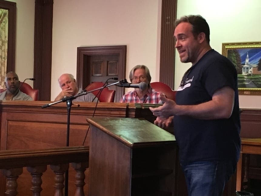 Tom Evans addresses task force members Tuesday at a public forum.