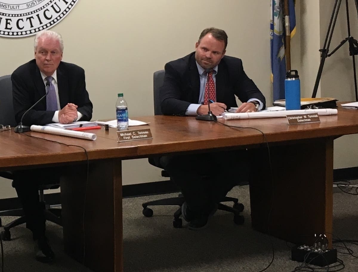 First Selectman Mike Tetreau (left) and Selectman Christopher Tymniak attend a board meeting Wednesday.