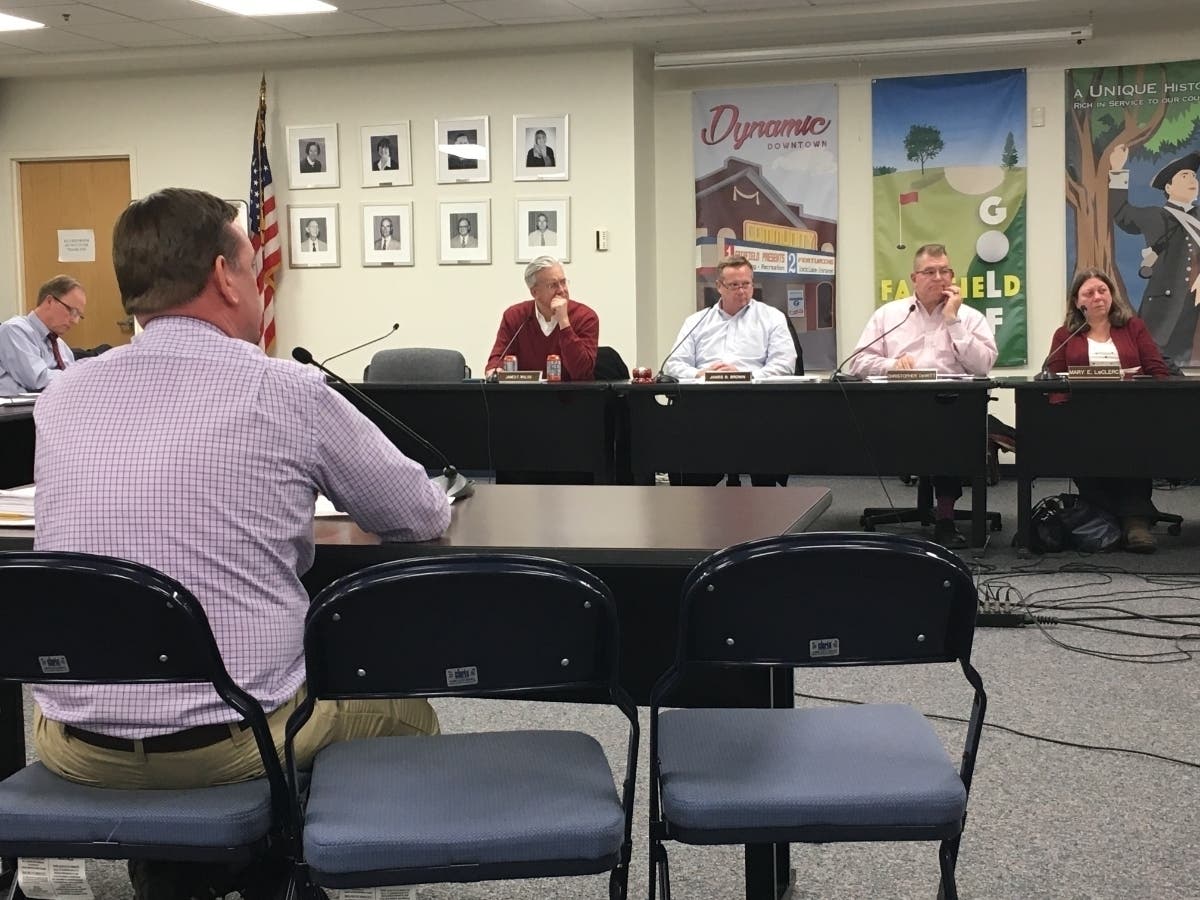 Conservation Director Brian Carey briefs the Board of Finance on Tuesday about contamination testing and remediation.
