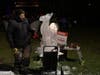Ice carver Bill Covitz demonstrates his craft on Sherman Green.