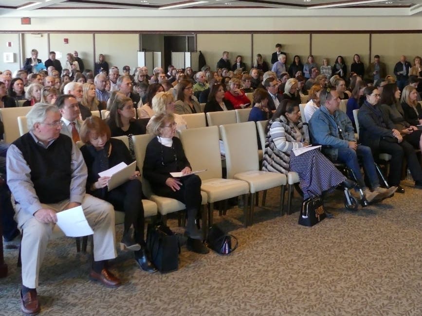A large crowd gathers for a state hearing Wednesday about a proposal from Newport Academy.