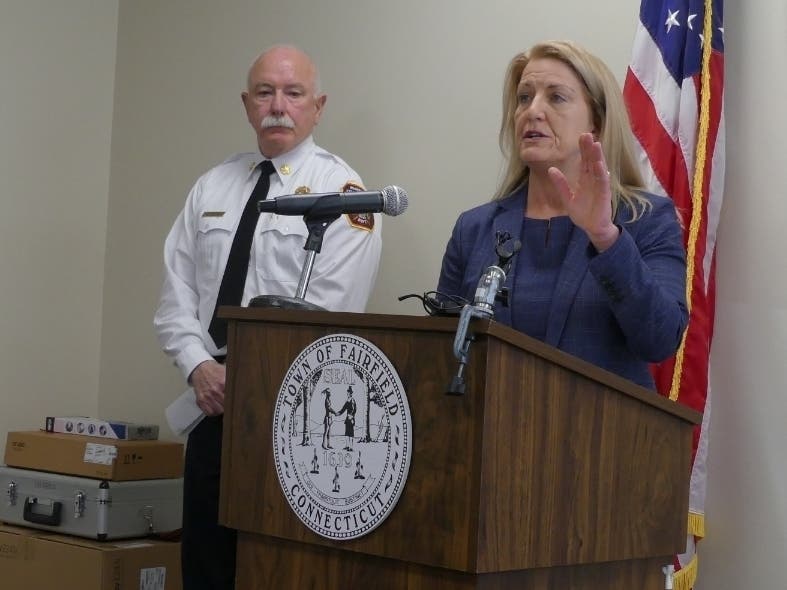 First Selectwoman Brenda Kupchick speaks Monday at a press conference.