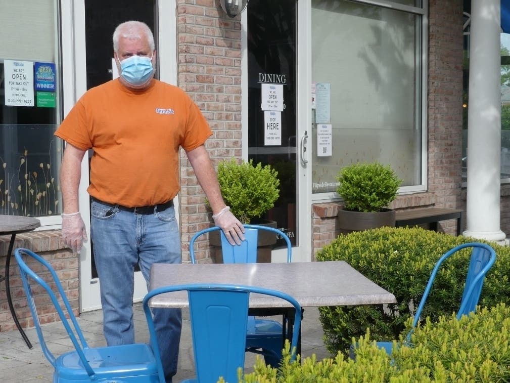 Flipside Burgers & Bar Owner Michael Baffa is set to open Wednesday for outdoor service.