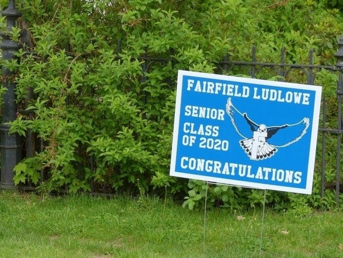 A sign in Fairfield congratulates a senior at Ludlowe high school.