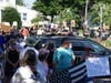 Police supporters and protesters gather outside the Fairfield police station.