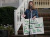 Kristen Frame speaks at a rally Monday.