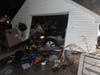 Stratford firefighters responded Thursday after a car hit a garage.