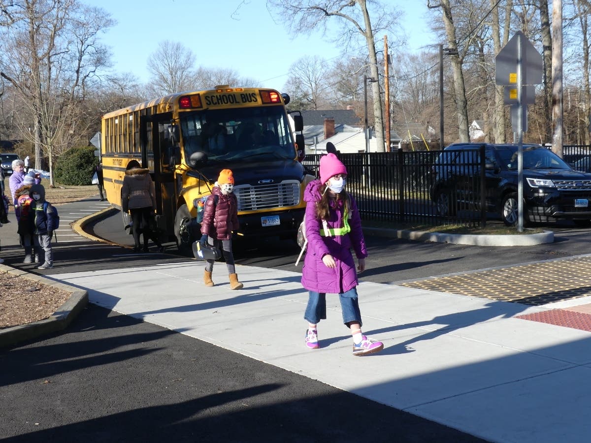 Holland Hill Elementary students head to class Monday.