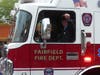 A Fairfield Fire Department vehicle rolls through the Fairfield Memorial Day Parade on Monday, May 31, 2021.