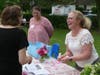 Pequot Library volunteer Charlotte Glovin works Friday at the Southport Garden Stroll.