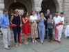 First Selectwoman Brenda Kupchick cuts a ribbon to celebrate the new roof at Pequot Library.