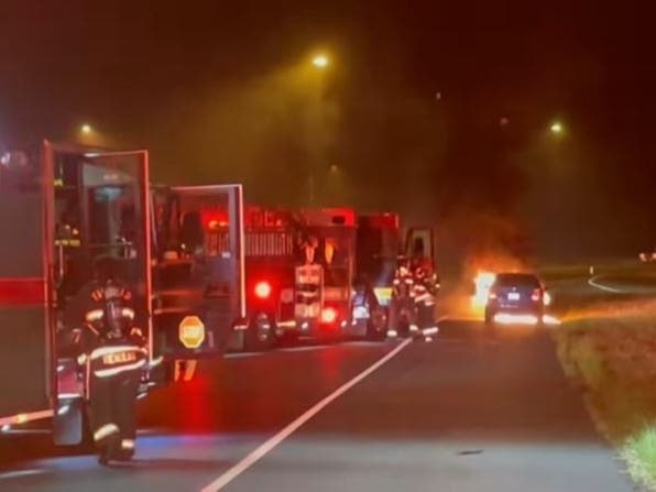 Firefighters respond to a car fire Tuesday.